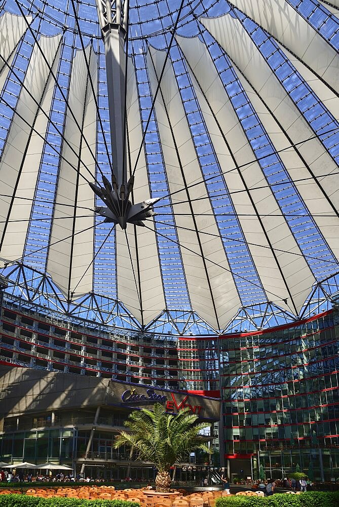 Germany, Berlin, Potzdamer Platz, Sony Centre with glass canopied roof over its central plaza.