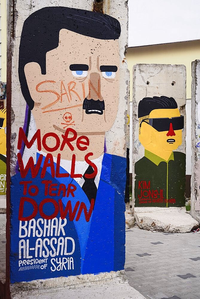 Germany, Berlin, Checkpoint Charlie, Open air exhibition showing Berlin Wall section making a political statement regarding Basher Al-Assad and alleged use of sarin.