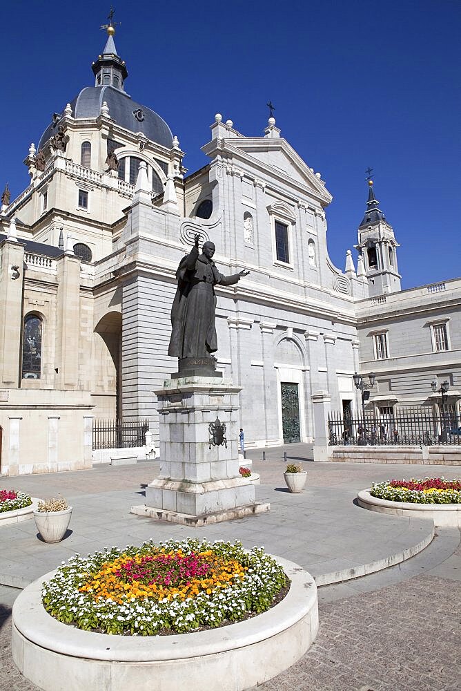 Cathedral de la Almudena with statue of Pope John Paul II in the courtyard