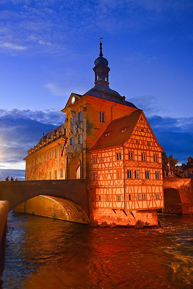 Germany, Bavaria, Bamberg, Altes Rathaus or Old Town Hall, Floodlit at dusk.