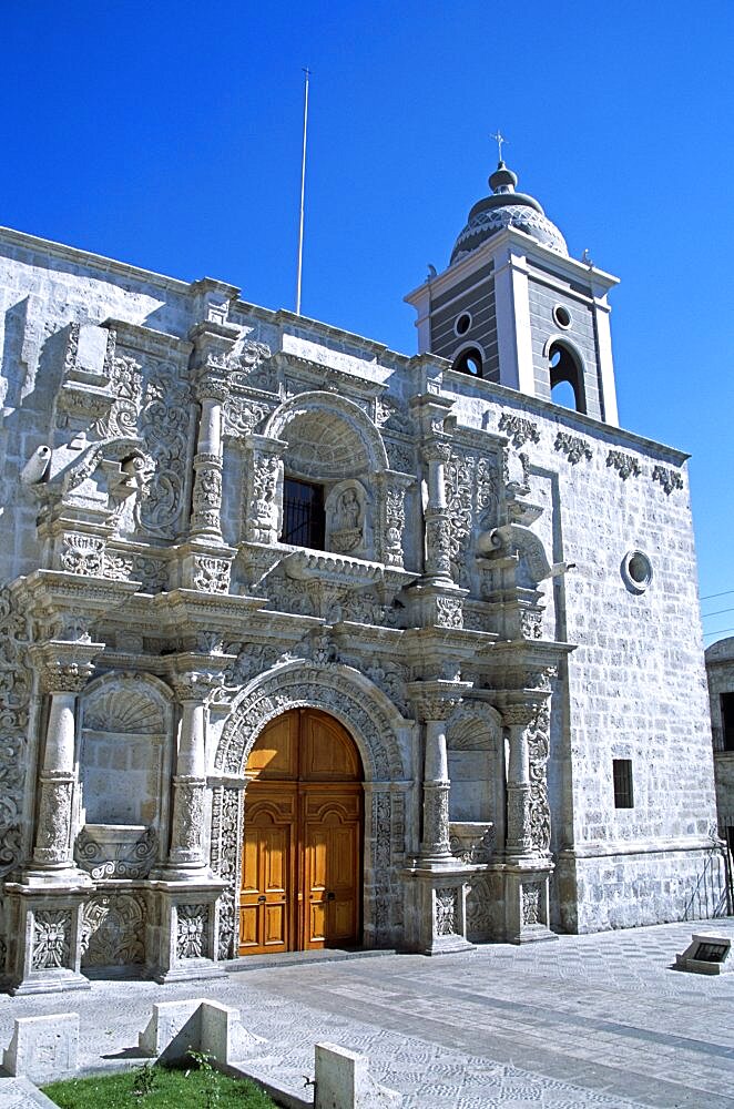 PERU  Arequipa Iglesia de San Agustin. Travel Tourism Holiday Vacation Explore Recreation Leisure Sightseeing Tourist Attraction Tour Destination Iglesia De San Saint St Agustin Arequipa Peru Peruvian South Southern America Latin Tranquility Tranquil City Traditional Sunny Culture Cultural Peaceful Building Architecture Architectural Church Churches Religion Religious Pray Prayer Worship Worshipping Worshiping Christianity Holy Divine Christian Theology Faith Sacred Devout Catholic Catholicism Ethnic Spanish Hispanic Colonial UNESCO World Heritage Site Blue Sky Vivid Vibrant Bell Tower Faade Edifice Ornate Intricate Colourful Colorful Colour Color Grey Gray Bright Entrance Door Doorway Detailed Columns Pillars Magnificent Impressive Majestic Calendar American South America