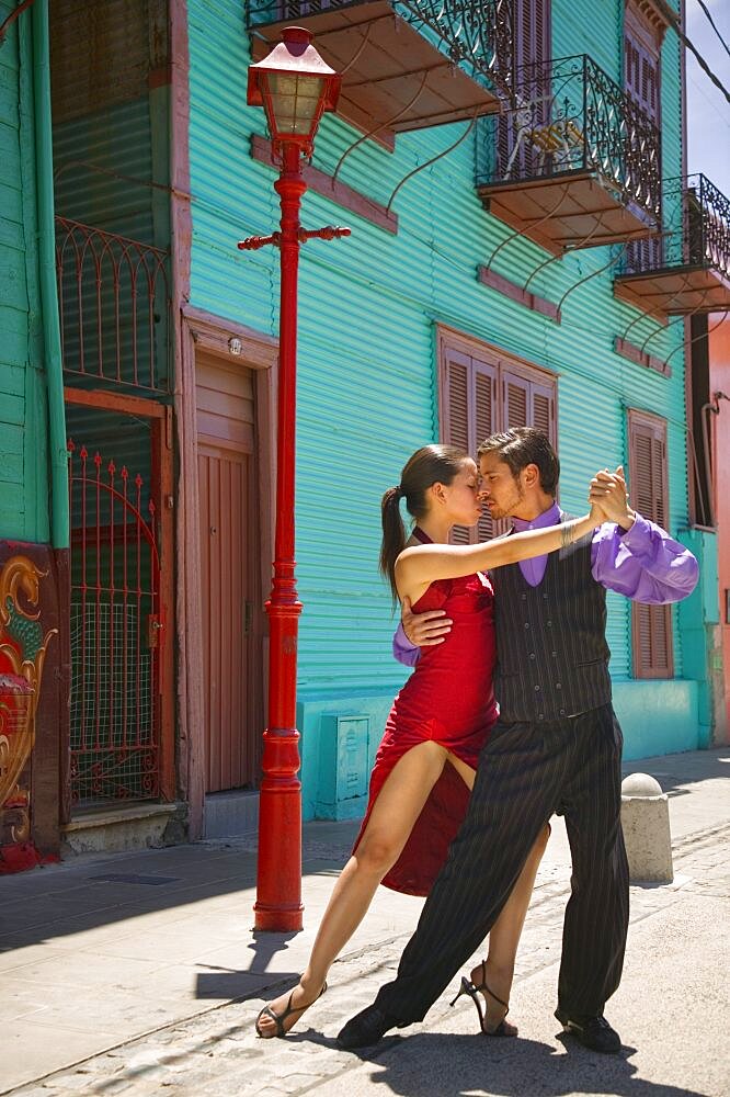 ARGENTINA  Buenos Aires Close-up of tango dancers in La Boca. Model Release Available La Boca Buenos Aires dance couple intimate Travel tango Latin America South America Argentina American Argentinian Hispanic Latino