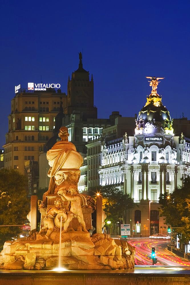 SPAIN  Madrid The fountain in Plaza Cibeles at dusk. Spain Madrid Europe Travel Tourism Holidays Night Ornamental Urban Capital City Landmark Chariot Grand Skyline Belle Epoch Art Deco Architecture Espainia Espana Espanha Espanya European Hispanic Nite Southern Europe Spanish