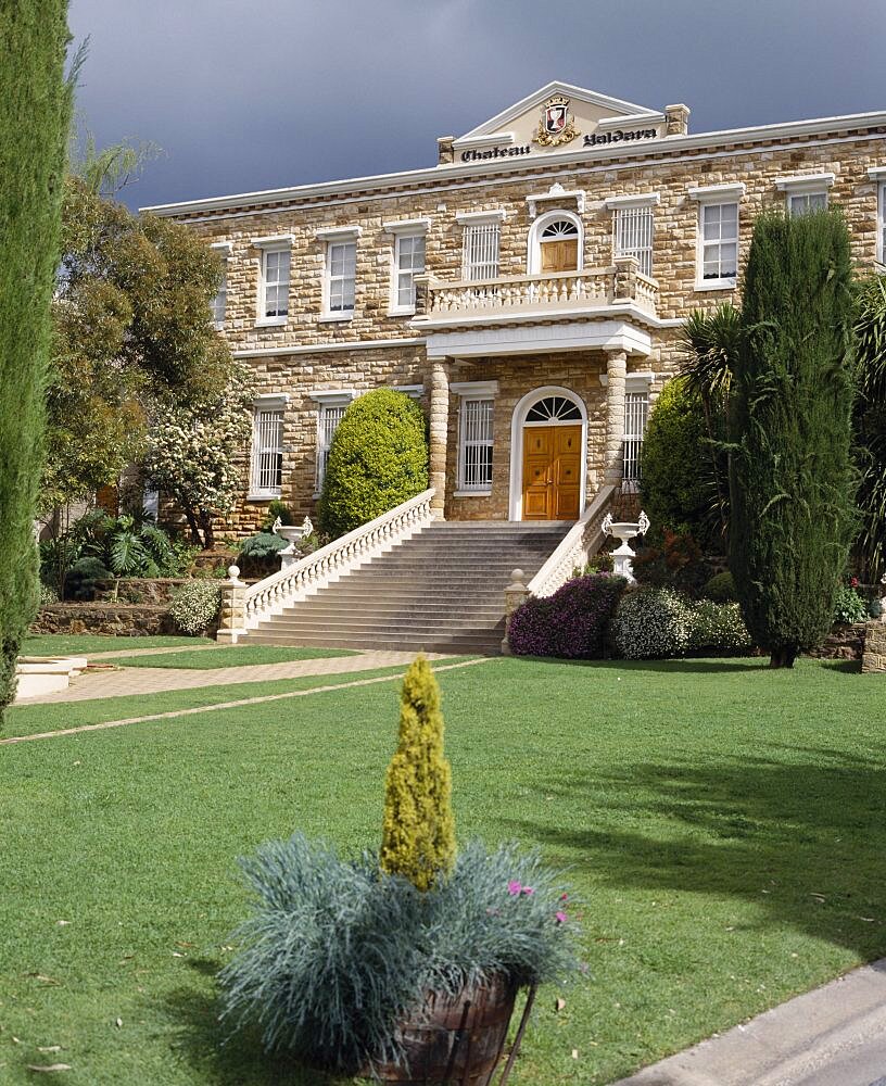 AUSTRALIA South Australia Barossa Valley Chateau Yaldara at Lyndock. The front entrance with wide steps to the house beyond the lawns and trees