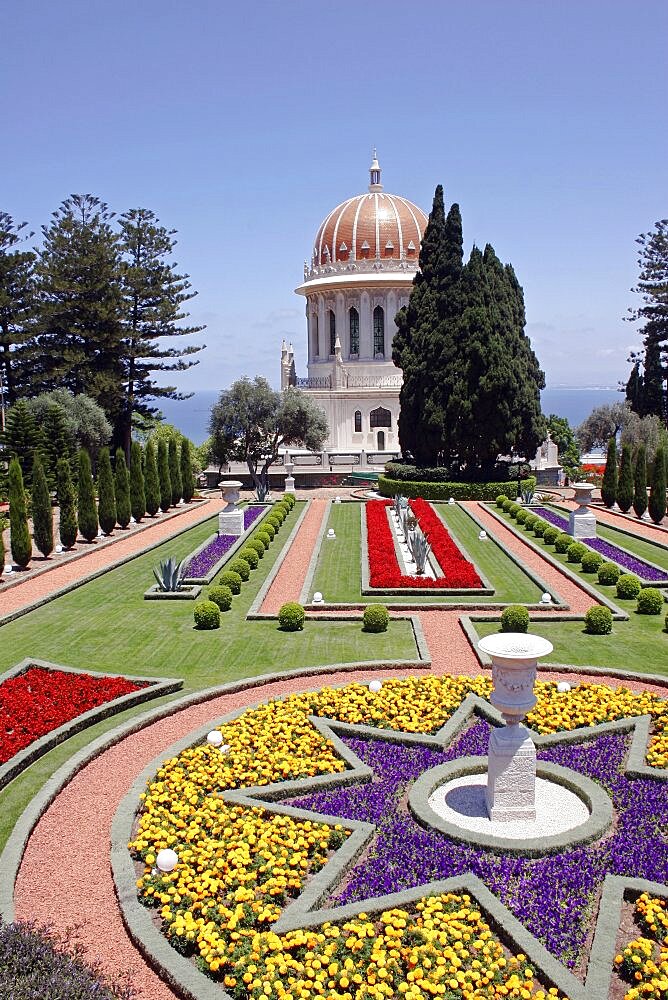 Zionism Avenue, View of Bahai Shrine and Gardens built as a memorial to the founders of the Baha i faith, Formal flower beds paths and cypress trees with domed shrine, Haifa, Israel