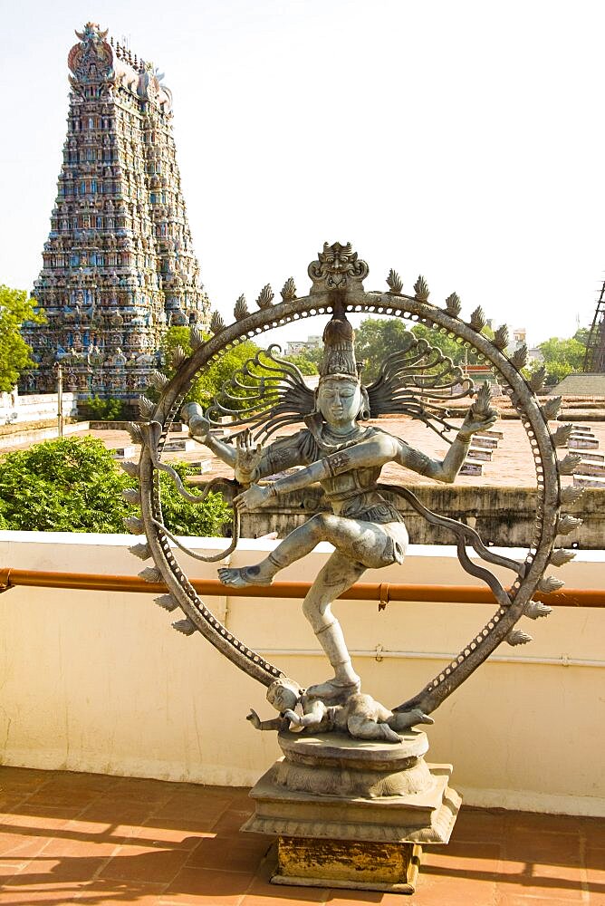 Nataraja, dancing posture of Hindu God Shiva, and a gopuram, Meenakshi Temple, Madurai, Tamil Nadu, India