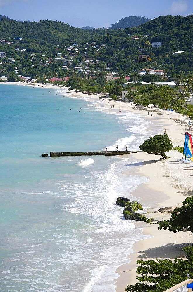 Aquamarine sea and the two mile stretch of the white sand of Grand Anse Beach, Grenada, West Indies, Caribbean, Central America