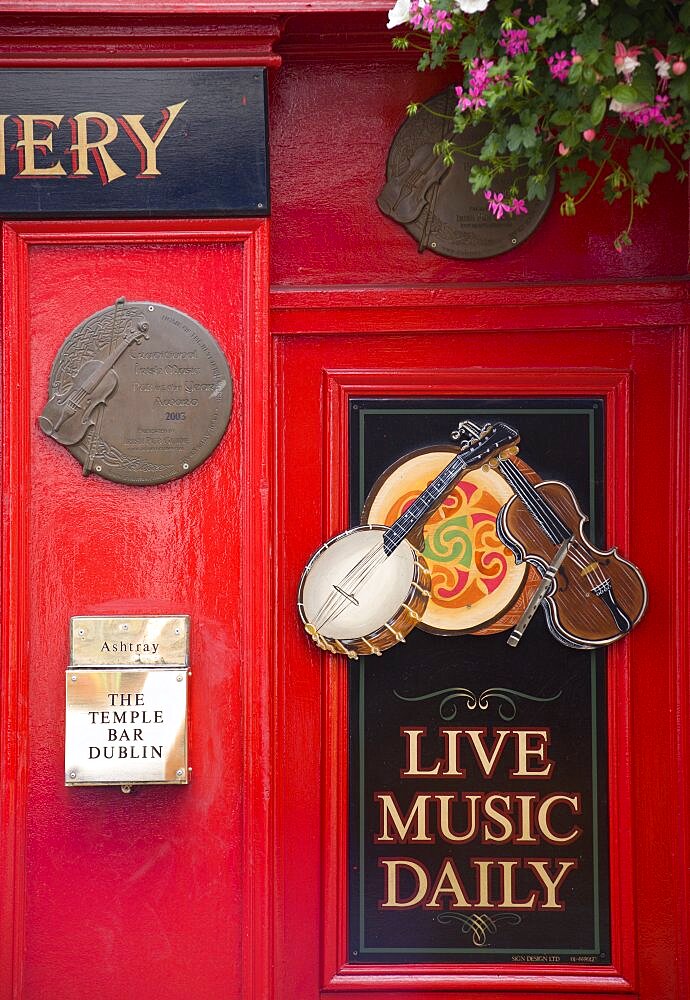 Ireland, County Dublin, Dublin City, Sign on Temple Bar traditioanl Irish pub advertising live music daily.