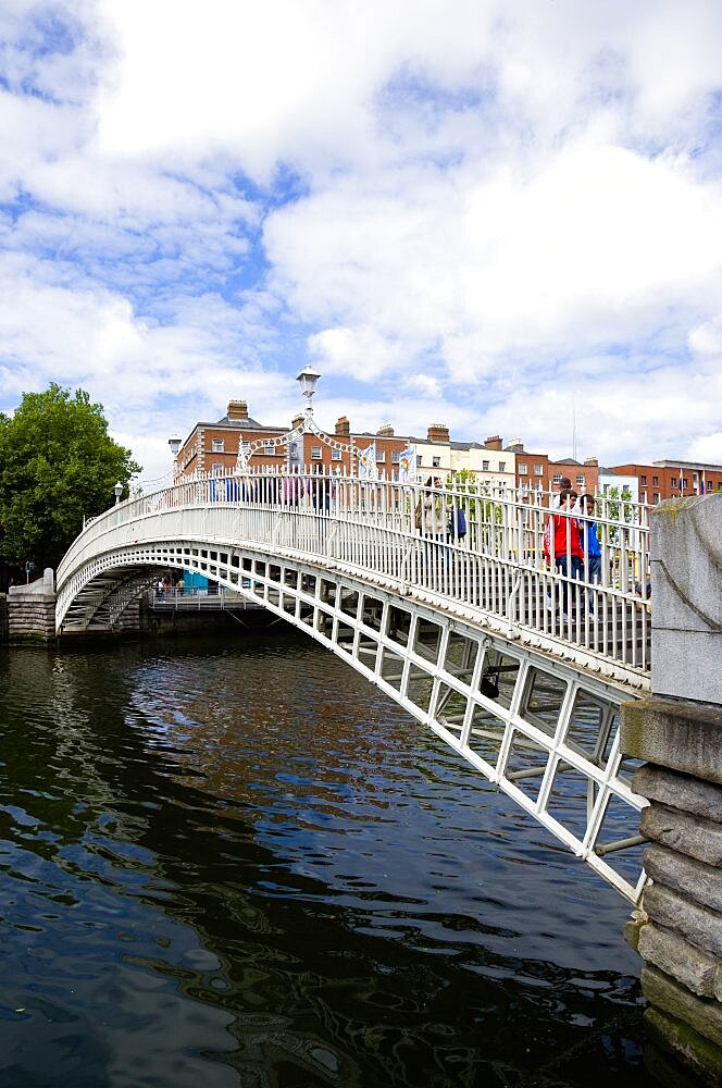 Ireland, County Dublin, Dublin City, The 1816 cast iron Ha Penny or Half Penny Bridge across the River Liffey.