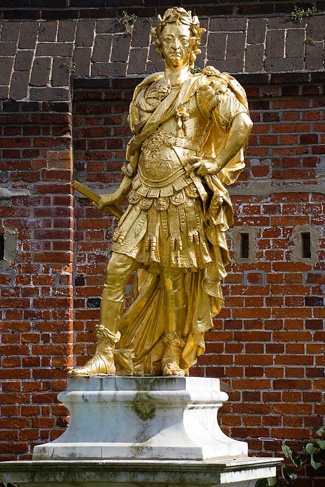 England, Hampshire, Portsmouth, Historic Naval Dockyard Gilded statue of King George III dressed as Roman Emperor.