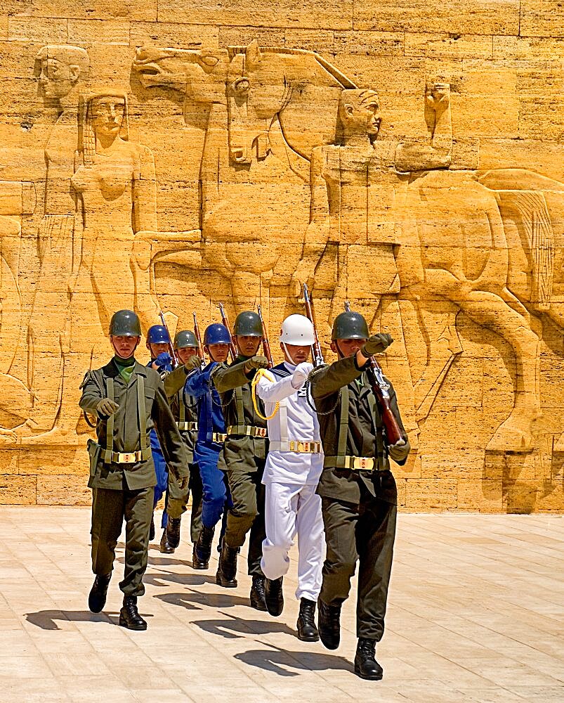 Turkey, Ankara, Anitkabir, Mausoleum of Mustafa Kemal Ataturk founder of the modern Turkish Republic and president in 1923. Changing of the Guard taking place in foreground of relief carved frieze.