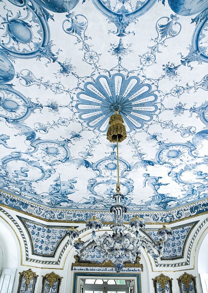 Germany, Bavaria, Munich, Nymphenburg Palace the Pagodenburg. Interior detail of elegant pavilion for royal relaxation with over 2000 blue and white painted Dutch tiles decorating the walls and ceiling.