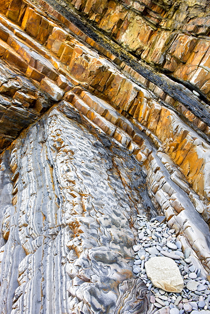 Geological rock strata at Sandymouth Bay in North Cornwall, England, United Kingdom, Europe