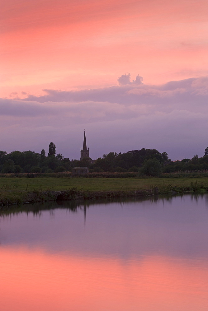 Beautiful sunset over the River Thames and the church spire of Lechlade, Oxfordshire, The Cotswolds, England, United Kingdom, Europe