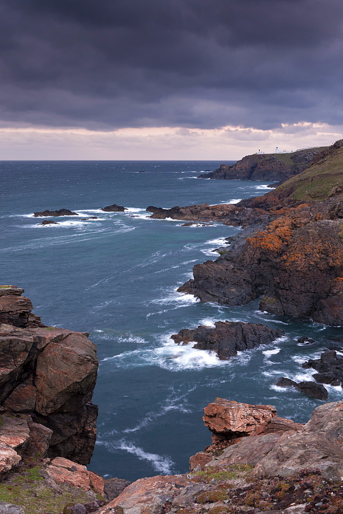 The Cornish coast at Trewellard Zawn looking towards Pendeen Lighthouse, Cornwall, England, United Kingdom, Europe