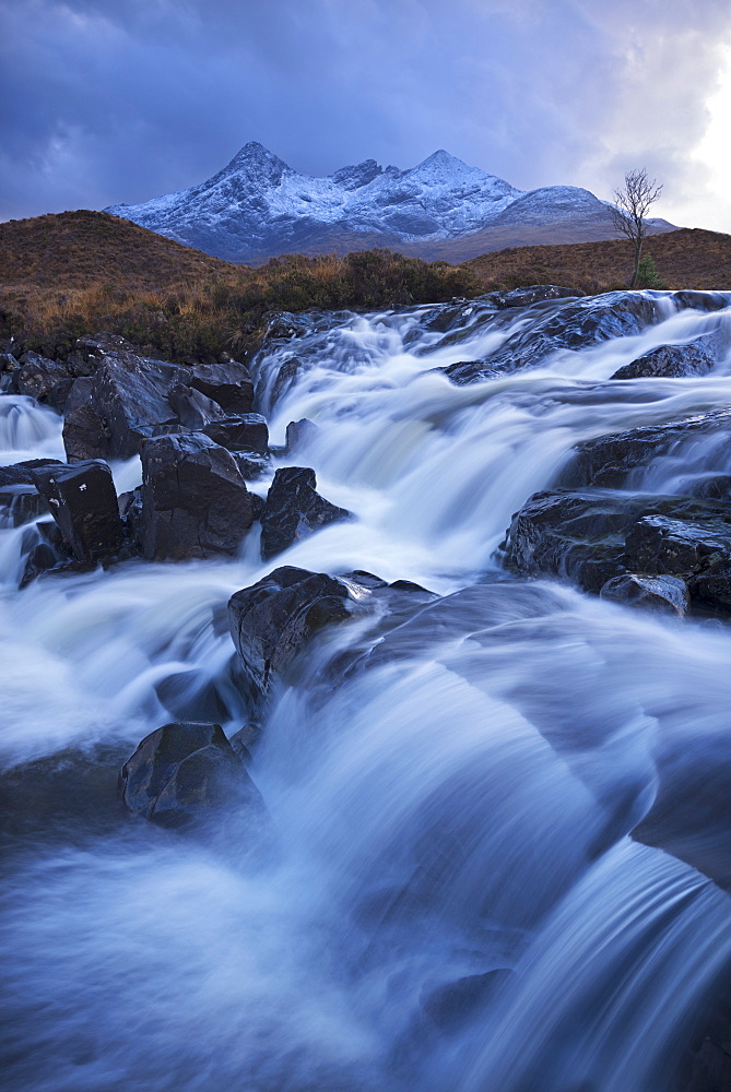 Waterfall on the River Sligachan in winter, with Sgurr nan Gillean mountain in the background, Isle of Skye, Inner Hebrides, Scotland, United Kingdom, Europe 