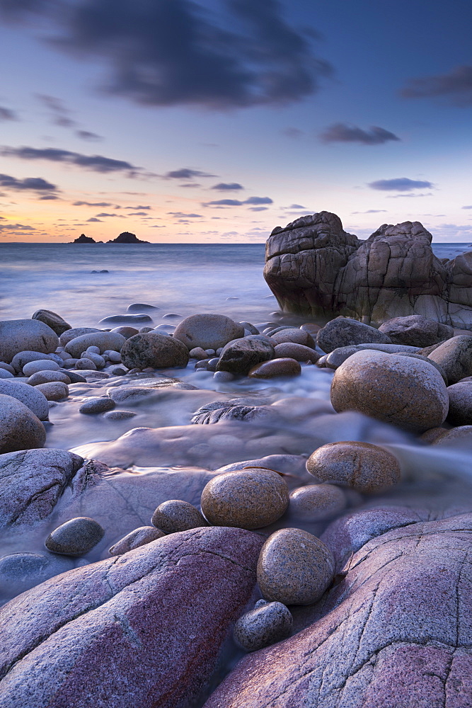 Twilight on the rocky Cornish cove at Porth Nanven, Cornwall, England, United Kingdom, Europe 