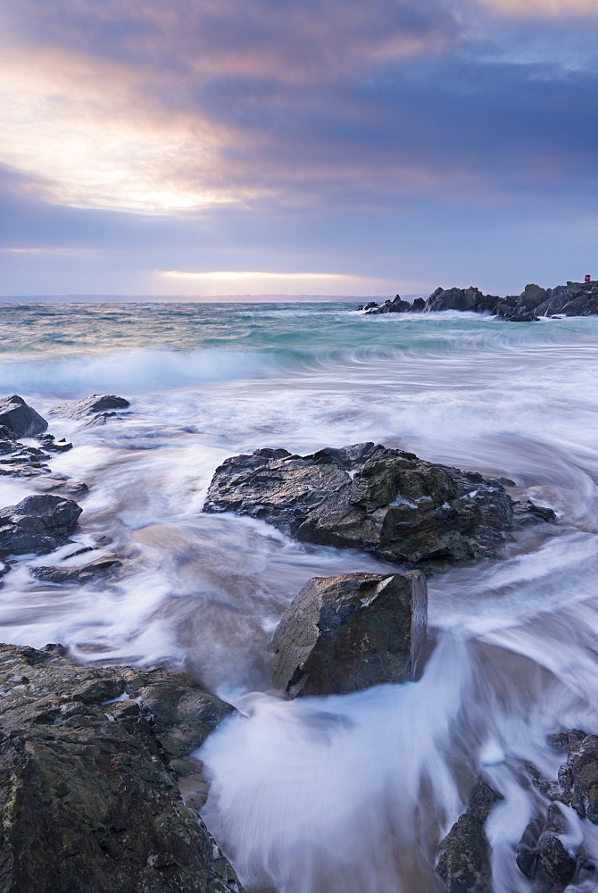 Winter sunrise at Porthgwidden Beach in St. Ives, Cornwall, England, United Kingdom, Europe 