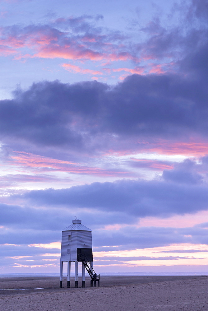 Sunset beyond wooden lighthouse at Burnham-on-Sea, Somerset, England, United Kingdom, Europe