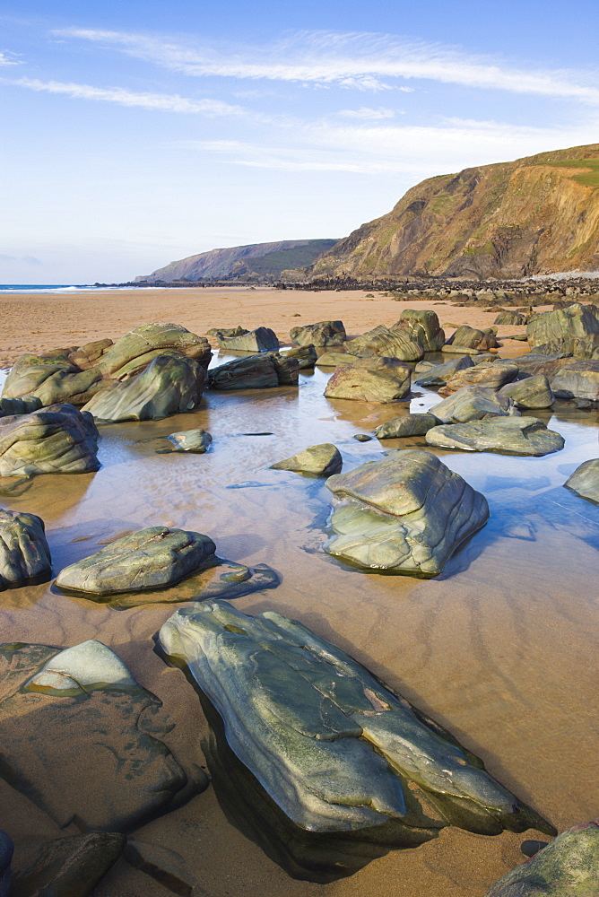 Rocks and rockpools on the beach at Sandymouth Bay, North Cornwall, England, United Kingdom, Europe