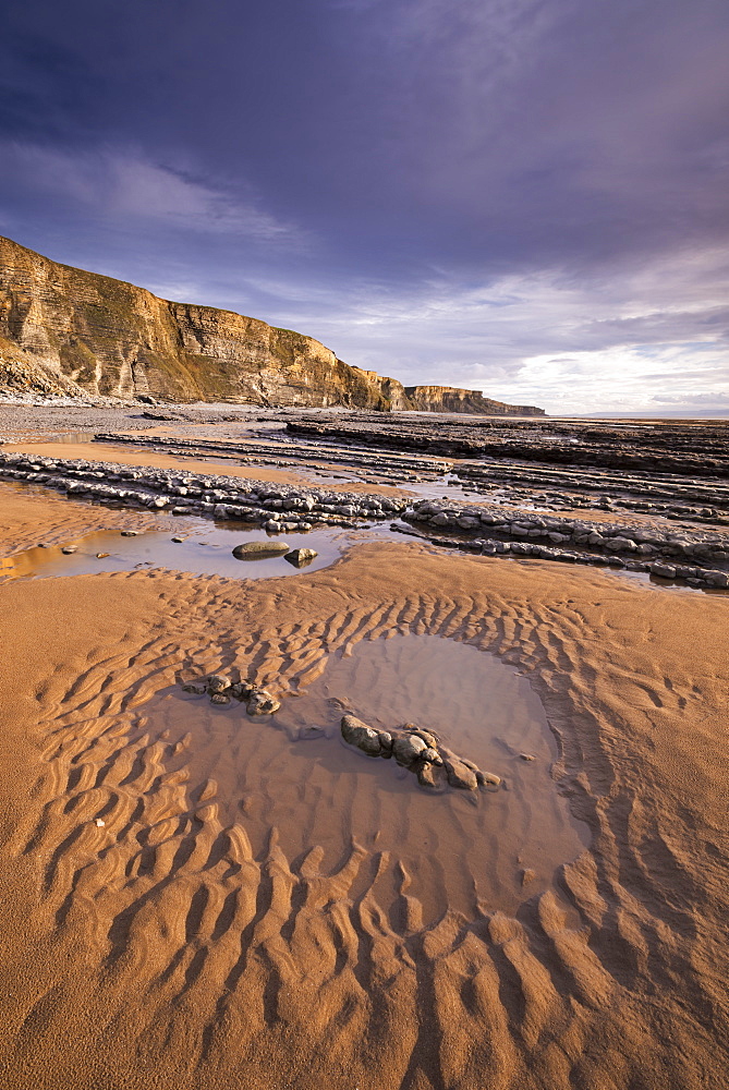 Tidal pools on the sandy beach near Dunraven Bay on the Glamorgan Coast, South Wales, Wales, United Kingdom, Europe