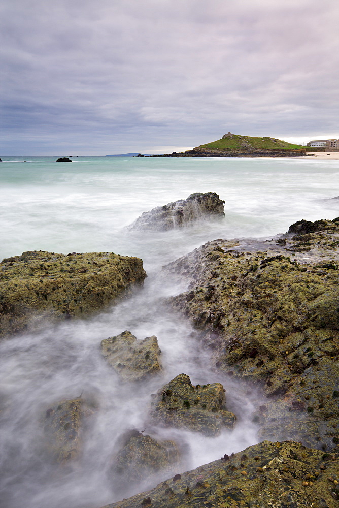 Rocky shores of Porthmeor Beach looking towards St. Ives Head, Cornwall, England, United Kingdom, Europe