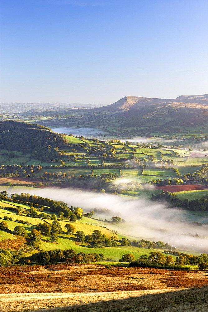 Rolling mist covered farmland in the Usk Valley, Brecon Beacons National Park, Powys, Wales, United Kingdom, Europe