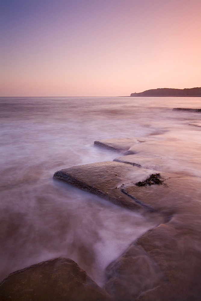 Swirling tide around the broken ledges at Kilve, Somerset, England, United Kingdom, Europe