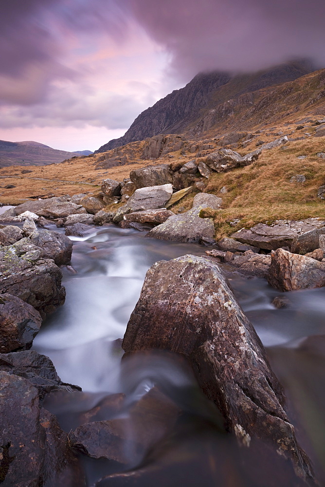 Rocky river in Cwm Idwal looking towards Tryfan at sunset, Snowdonia National Park, Conwy, Wales, United Kingdom, Europe