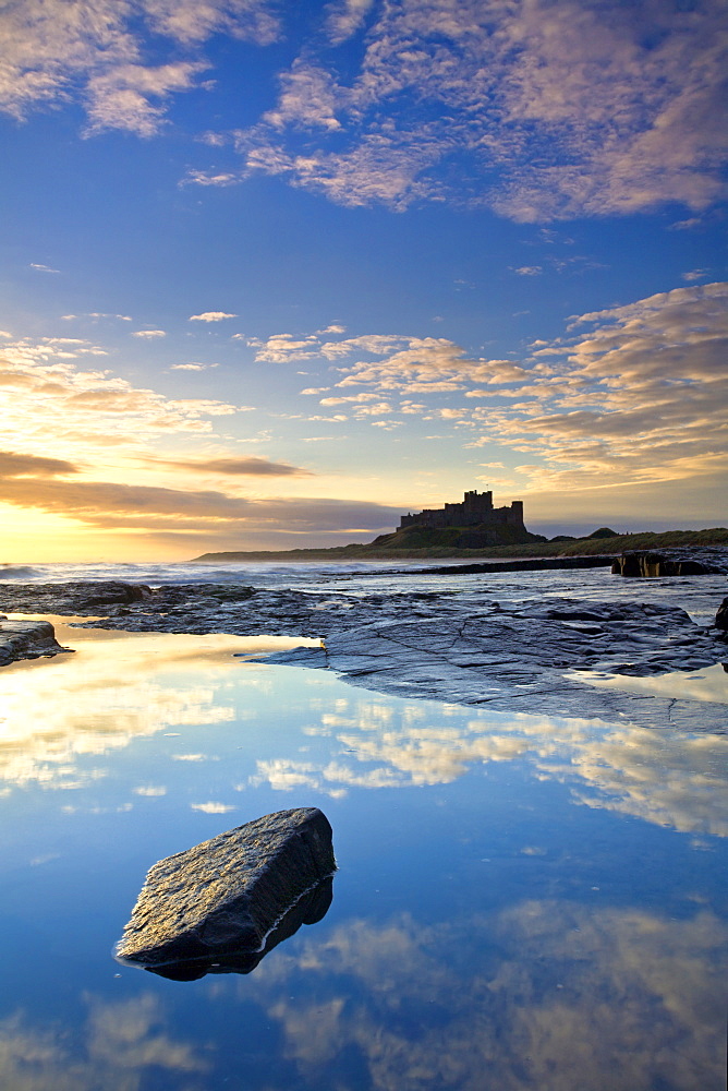 Bamburgh Castle at dawn in November, Bamburgh, Northumberland, England, United Kingdom, Europe