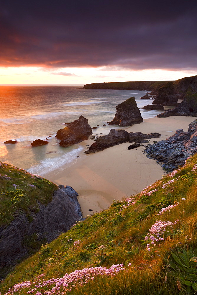 Sunset over Bedruthan Steps in spring, North Cornwall, England, United Kingdom, Europe