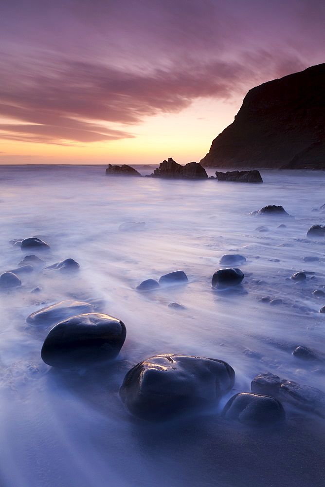 Twilight on the beach at Duckpool on the North Cornish Coastline, Cornwall, England, United Kingdom, Europe