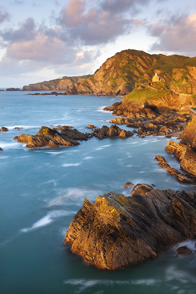 St. Nicholas Chapel and Beacon Point on the rocky coast of Ilfracombe, Devon, England, United Kingdom, Europe