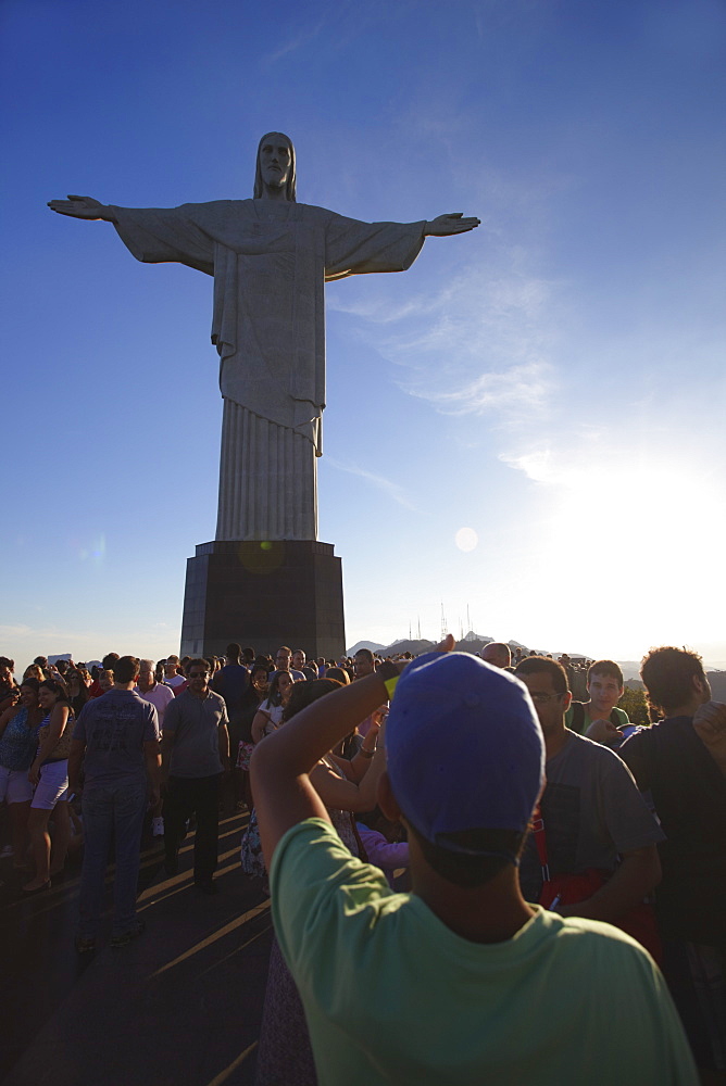 Tourists looking at Christ the Redeemer statue (Cristo Redentor), Corvocado, Rio de Janeiro, Brazil, South America 