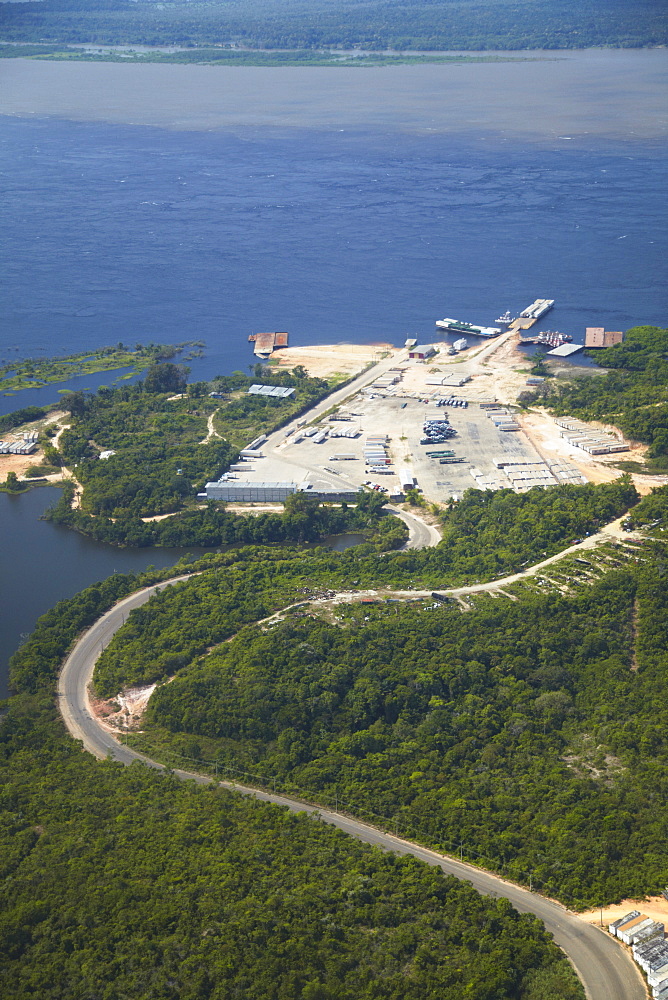 Aerial view of rainforest cleared for industry along the Rio Negro, Manaus, Amazonas, Brazil, South America 