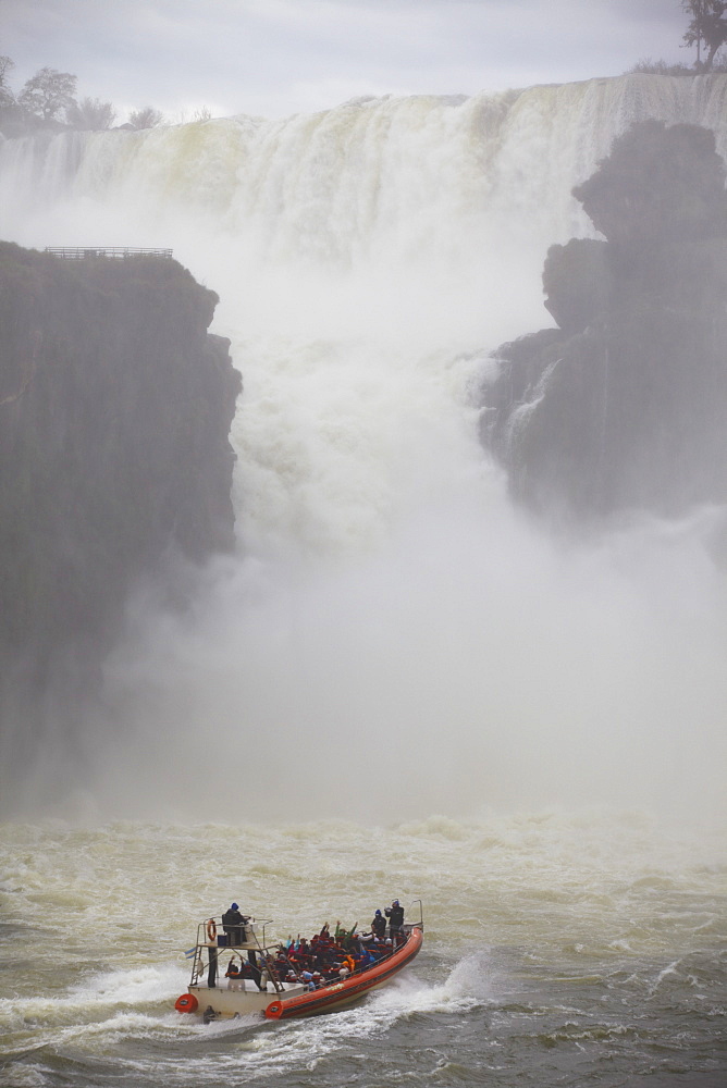 Tourist boat at Iguazu Falls, Iguazu National Park, UNESCO World Heritage Site, Misiones, Argentina, South America