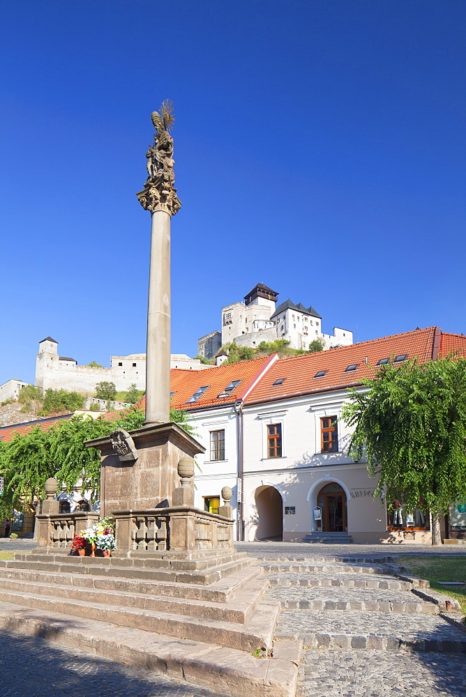 Monument in Mierove Square and Trencin Castle, Trencin, Trencin Region, Slovakia, Europe 