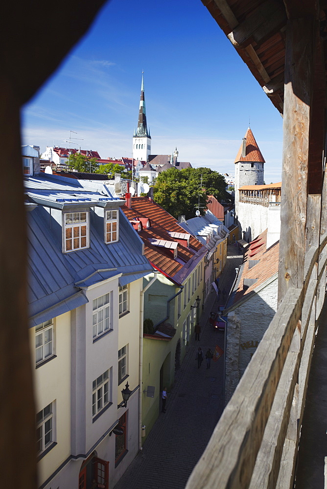 View of Lower Town from Town Wall with Oleviste Church in background, Tallin, Estonia, Baltic States, Europe