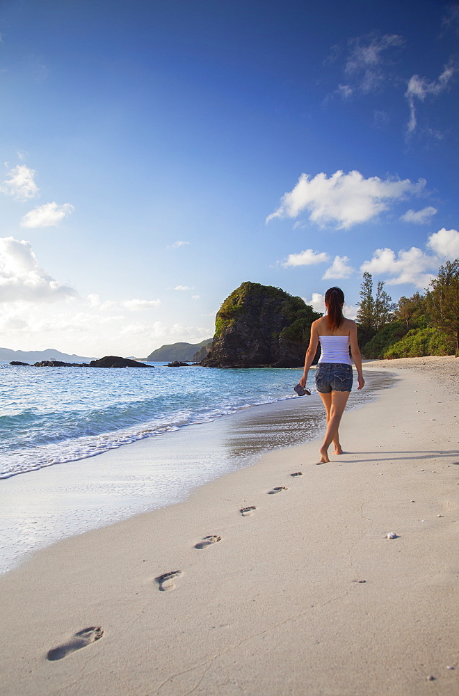 Woman walking on Furuzamani Beach, Zamami Island, Kerama Islands, Okinawa, Japan, Asia 