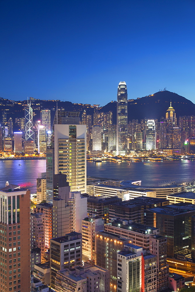 View of Hong Kong Island and Tsim Sha Tsui skylines at dusk, Hong Kong, China, Asia