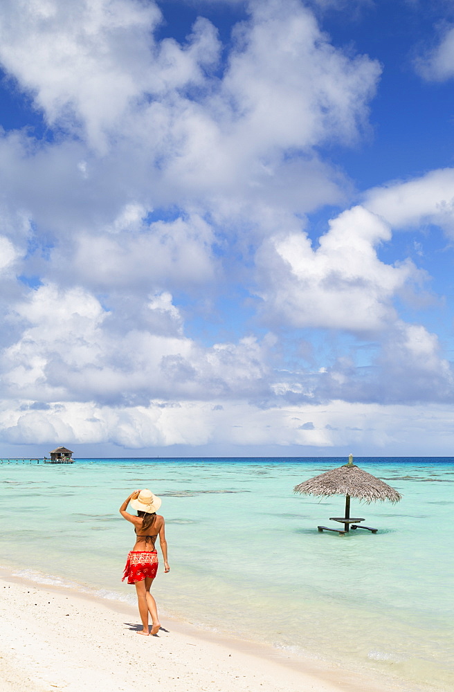 Woman walking on beach, Fakarava, Tuamotu Islands, French Polynesia, South Pacific, Pacific