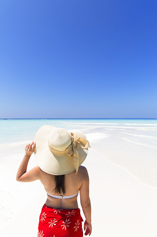 Woman on sandbank, Rasdhoo Island, Northern Ari Atoll, Maldives, Indian Ocean, Asia