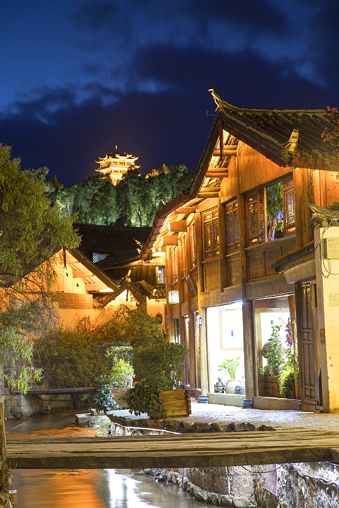 Canalside buildings at dusk, Lijiang, UNESCO World Heritage Site, Yunnan, China, Asia