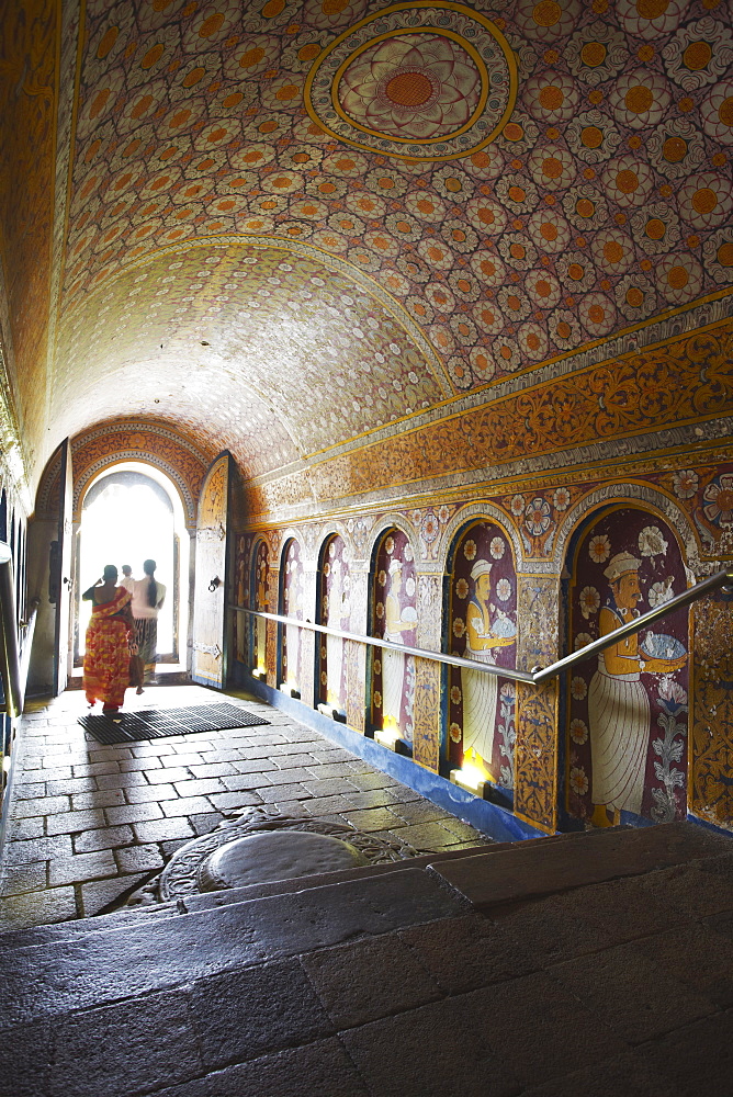 People leaving Temple of the Tooth (Sri Dalada Maligawa), Kandy, Sri Lanka, Asia