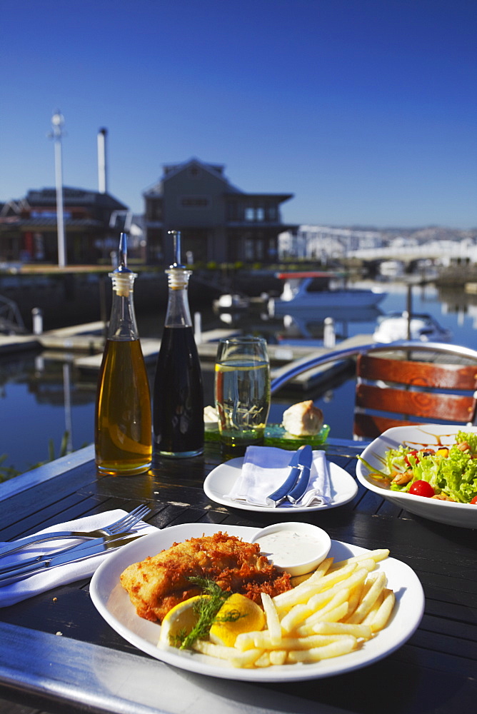 Fish and chips at outdoor restaurant, Thesen's Island, Knysna, Western Cape, South Africa, Africa