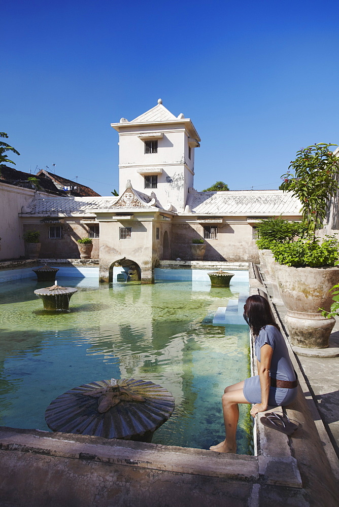 Woman at Taman Sari (Water Castle), Yogyakarta, Java, Indonesia, Southeast Asia, Asia