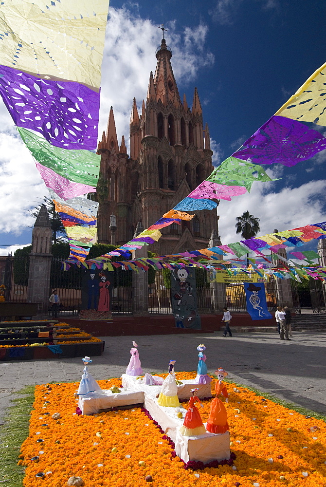 Decorations for the Day of the Dead festival with Parroquia de San Miguel Arcangel in the background, Plaza Principal, San Miguel de Allende, Guanajuato, Mexico, North America