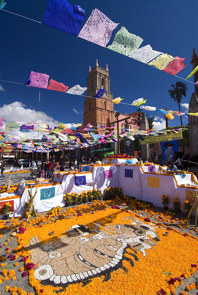 Decorations for the Day of the Dead festival with Iglesia de San Rafael in the background, Plaza Principal, San Miguel de Allende, Guanajuato, Mexico, North America