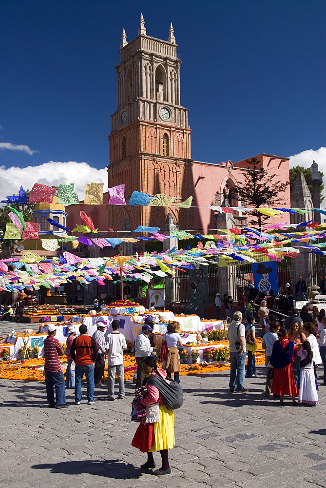 Decorations for the Day of the Dead festival, with Iglesia de San Rafael in the background, Plaza Principal, San Miguel de Allende, Guanajuato, Mexico, North America