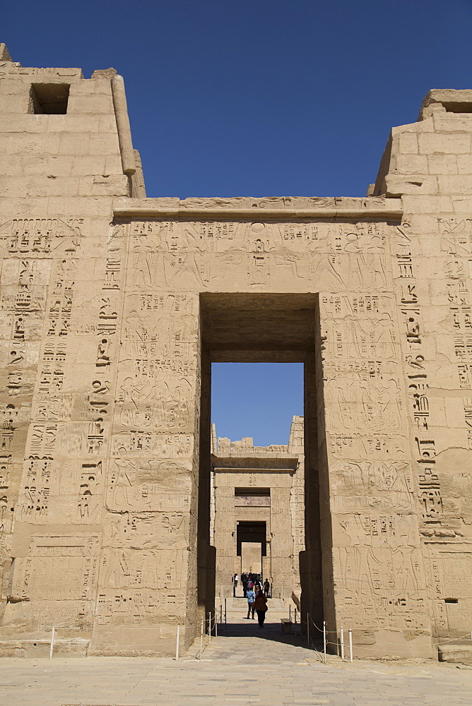 Doorway of First Pylon with view of doorway to Second Pylon, Medinet Habu (Mortuary Temple of Ramses III), West Bank, Luxor, Thebes, UNESCO World Heritage Site, Egypt, North Africa, Africa